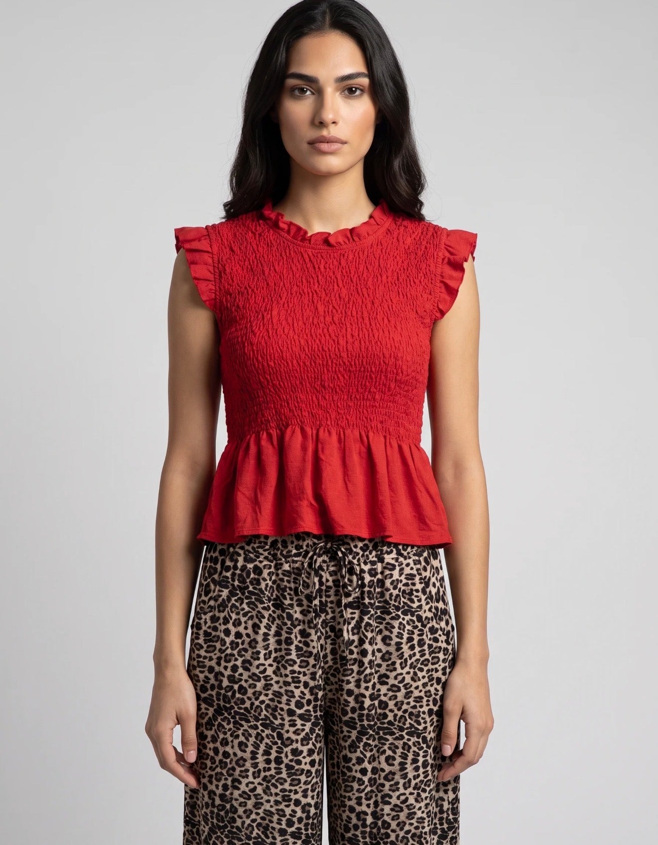 Black Smocked Peplum Top