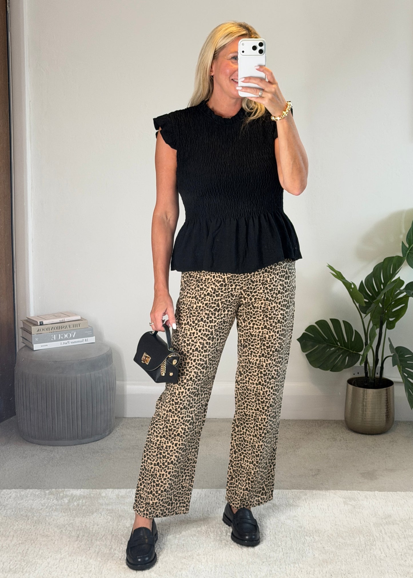 Black Smocked Peplum Top