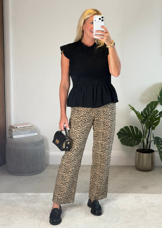 Black Smocked Peplum Top