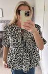 Leopard Tie Front Peplum Top