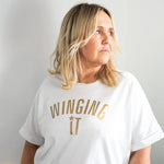 Winging It Gold Loose Fit T Shirt